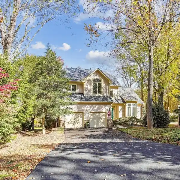 SUNLIT RETREAT OVERLOOKING BUTLER POND