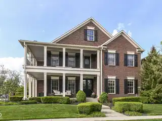 Stunning Corner Lot Brick Masterpiece