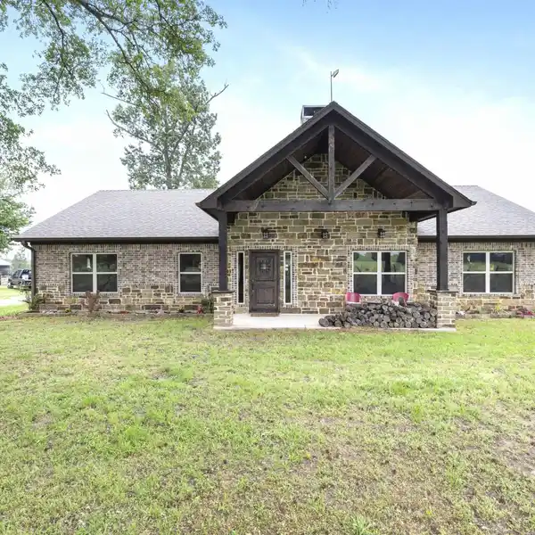 CUSTOM RANCH HOME ON 81.77 ACRES