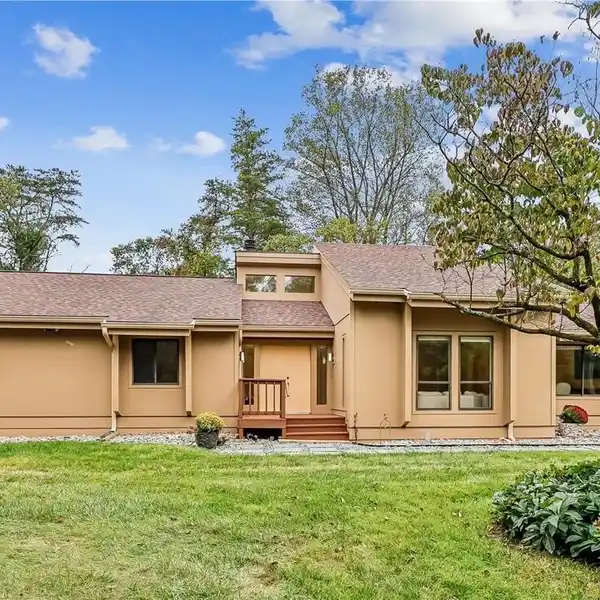 ARCHITECTURALLY DESIGNED CUSTOM-BUILT RANCH