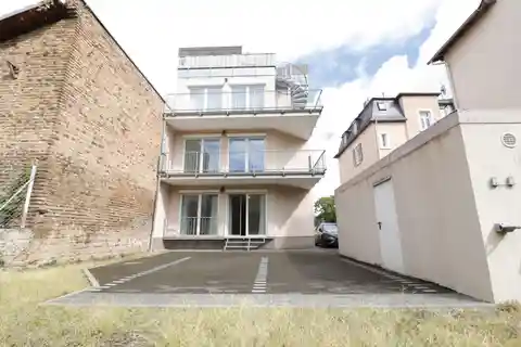 Centrally Located Three-Family House with Large Roof Terrace