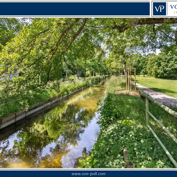 EXCLUSIVE MAISONETTE APARTMENT DIRECTLY ON THE CANAL