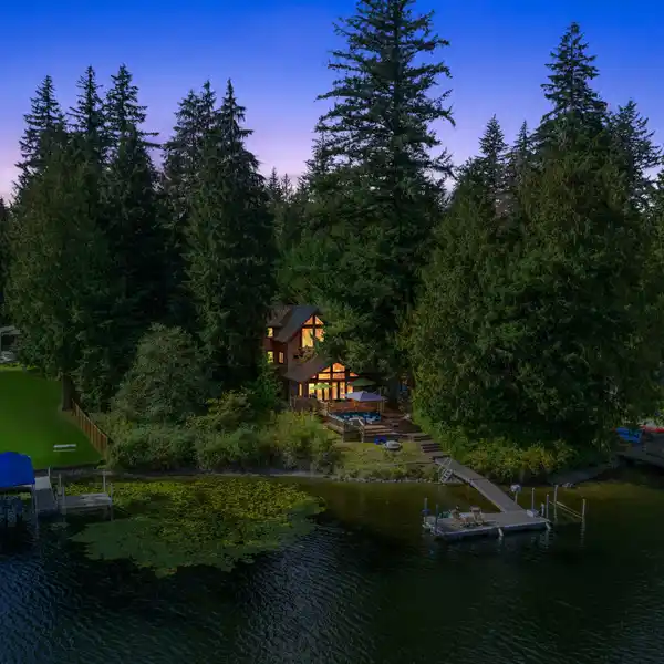 INCREDIBLE CUSTOM CRAFTSMAN PROPERTY ON FLOWING LAKE
