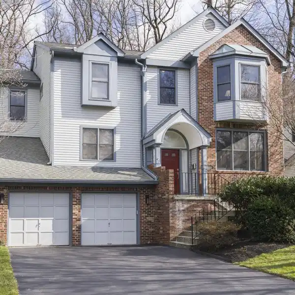 EXPANDED COLONIAL-CONTEMPORARY WITH AN OPEN LAYOUT