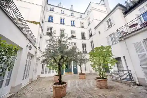 Charming 19th-century Apartment with Courtyard Views
