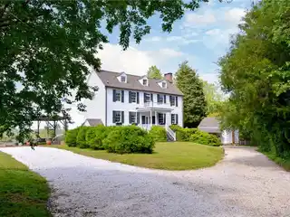 Timeless Waterfront Estate with Saltwater Pool