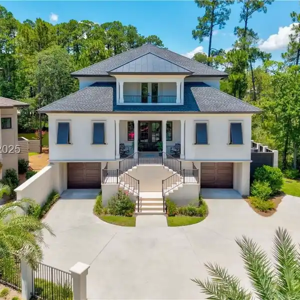 EXQUISITE RESIDENCE ON A SERENE GARDEN LOT