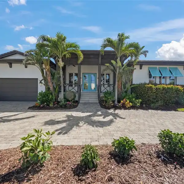 CUSTOM WEST INDIES STYLE HOME IN AN AMAZING LOCATION