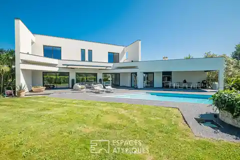 Architectural Gem with Expansive Landscaped Grounds