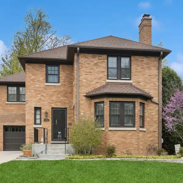 BEAUTIFULLY MAINTAINED AND UPGRADED BRICK HOME