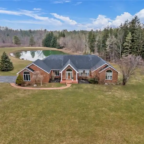 EXQUISITE ALL-BRICK RANCH ON 17 ACRES