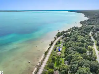 Beautifully Styled Retreat with 100 Feet of Private Sandy Frontage