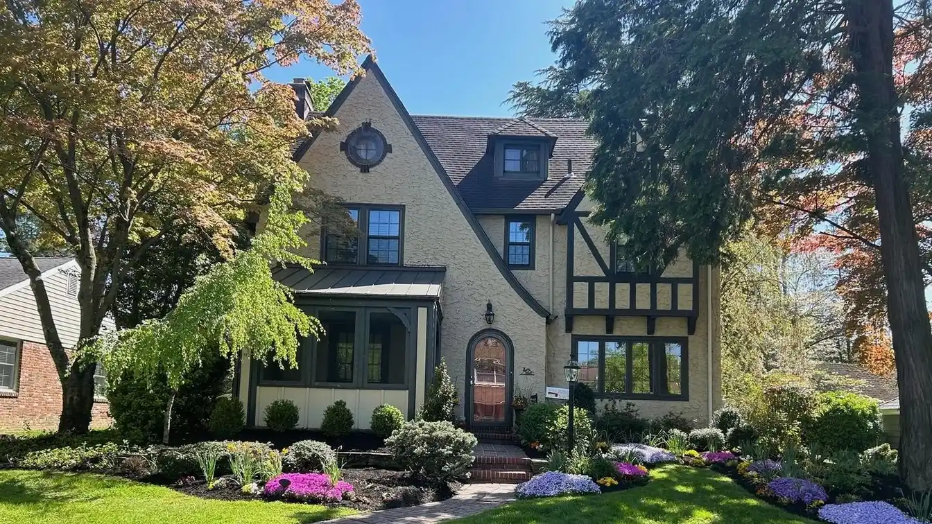 Elegant Tudor-style Center Hall Colonial