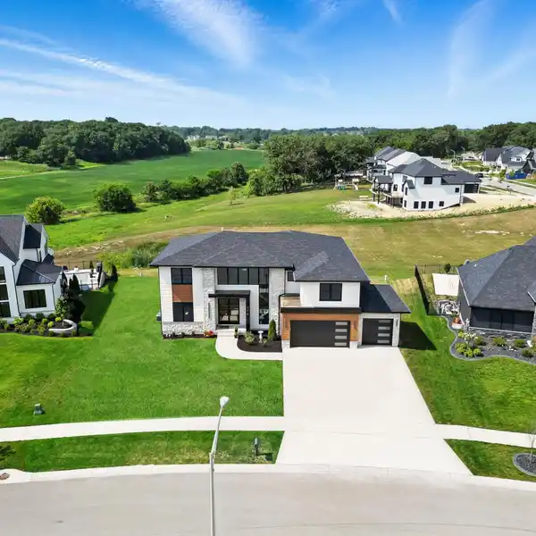 CUSTOM HOME WITH PEACEFUL MEADOW VIEWS