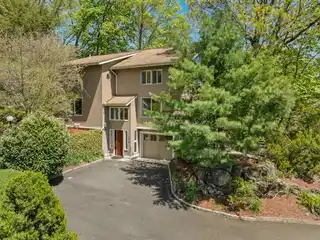Striking Contemporary with Treetop Views