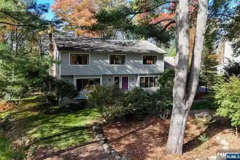 Gracious Colonial with Sunlit Gathering Spaces