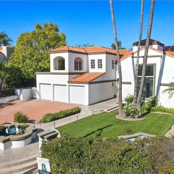 INVITING FAMILY ROOM WITH EXPANSIVE PICTURE WINDOWS