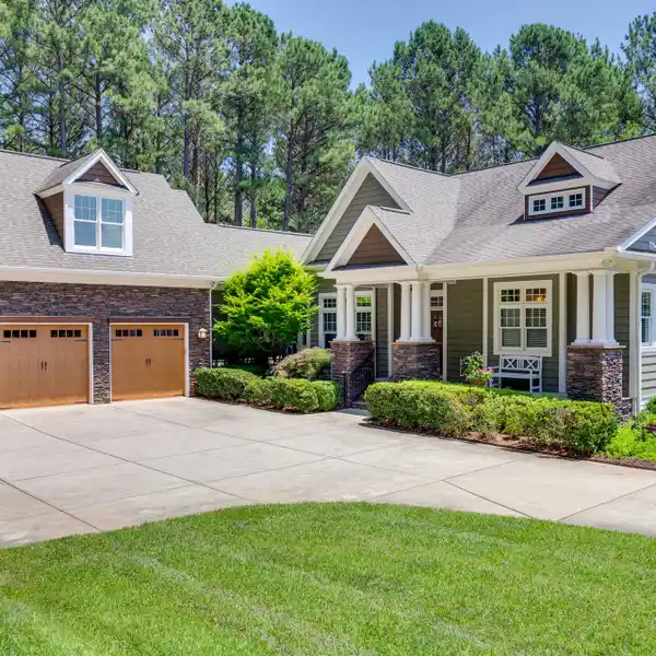 REFINED LAKEFRONT LIVING ON TWO SECLUDED ACRES