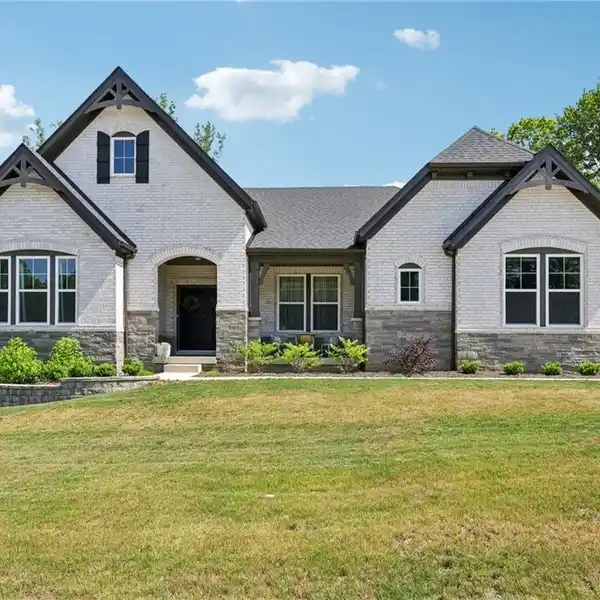 MODERN ELEGANCE ON NEARLY ONE-ACRE LOT