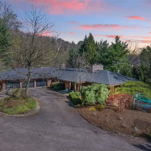 ARCHITECTURALLY STUNNING HOME ON TWO ACRES