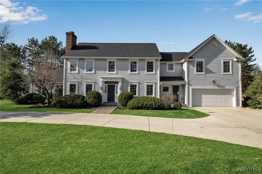 Exquisite Colonial Home on a Manicured Lot