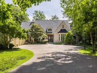 French Country-Inspired Residence on 2.8 Wooded Acres