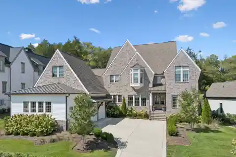 Modern Tudor-Style Brick Home in the Grove