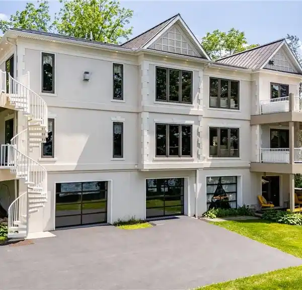 LUXURY HOME ON RARE LEVEL LAKEFRONT