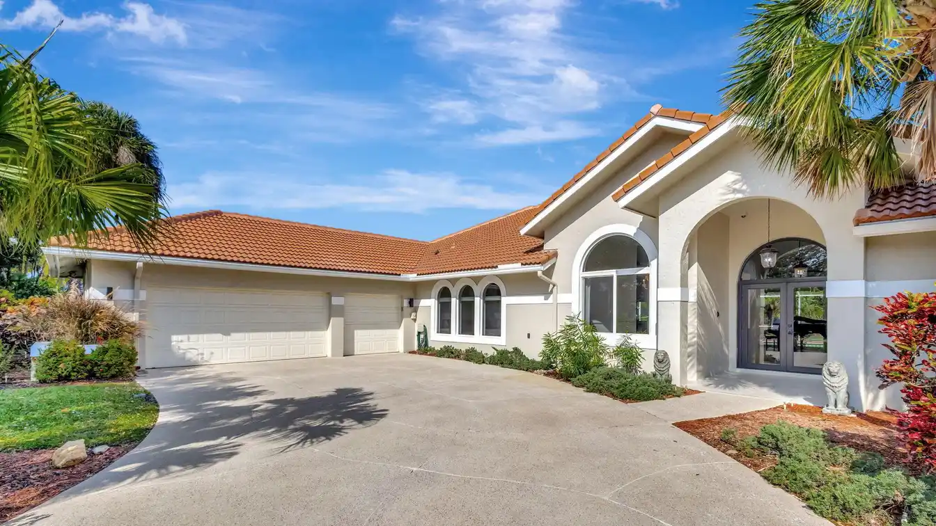 Sophisticated Residence in the Coveted Banyan Lakes Gated Community