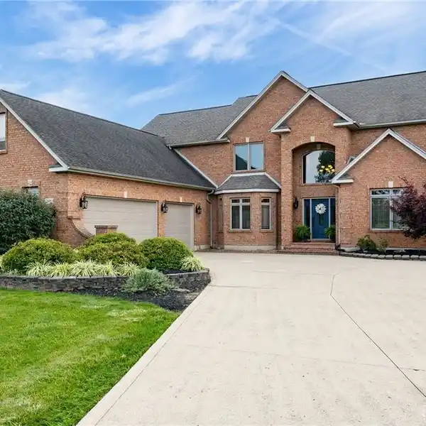 CUSTOM HOME ON TWO ACRES OVERLOOKING JASPER HILLS GOLF CLUB