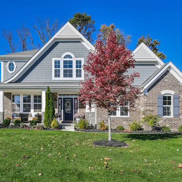 ELEGANT WASHINGTON TOWNSHIP HOME WITH COVERED PATIO & FIREPLACE