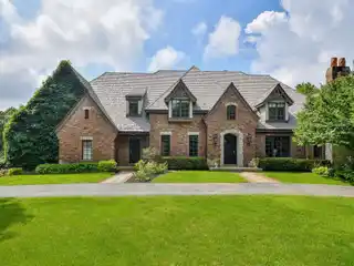Stately All-Brick Home Framed by Circular Driveway