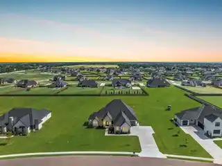 Experience Sophisticated Living in This Gated Addington Farms Retreat