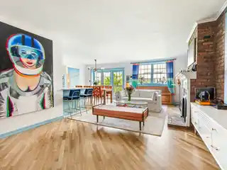 Sun-Drenched Duplex with Large Balcony