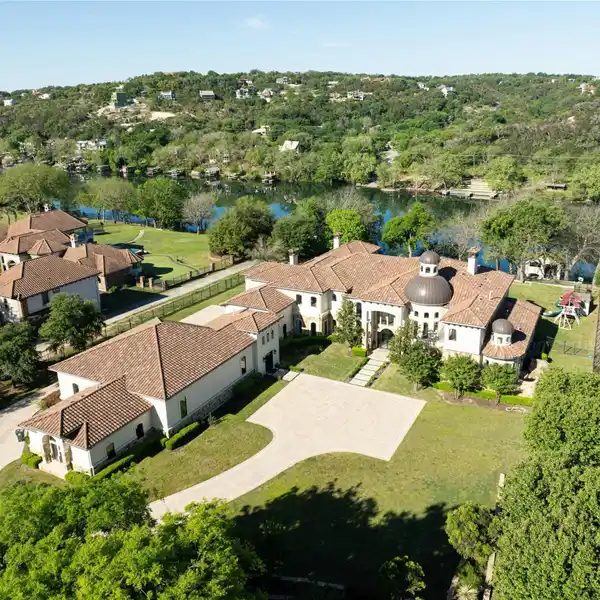 ELEGANT LAKEFRONT RETREAT WITH PRIVATE DOCK