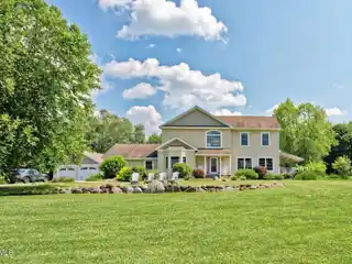 Stunning Lakefront Estate with Exclusive Beach Rights