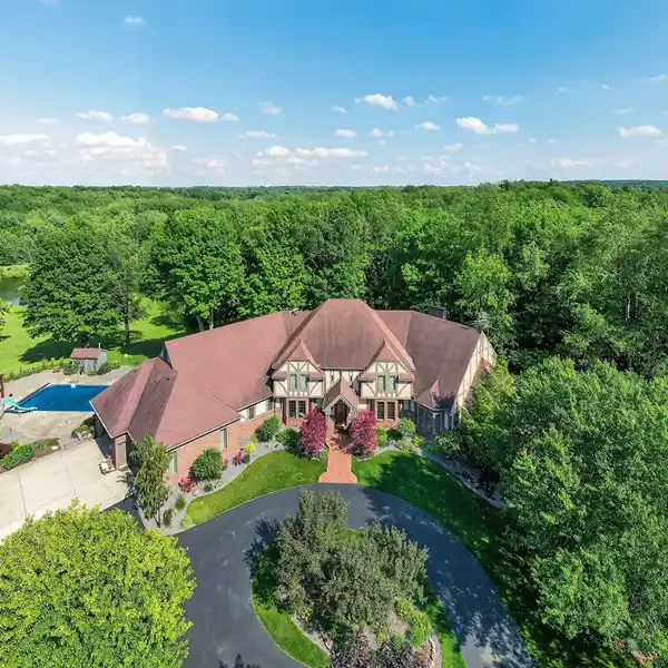 SECLUDED COUNTRY ESTATE NESTLED ON 37 PICTURESQUE ACRES