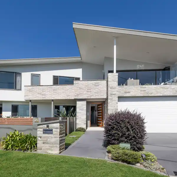 REFINED COASTAL LIVING WITH STUNNING OCEAN VISTAS