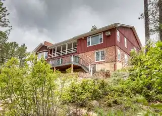 SPACIOUS WALKOUT RANCHER ON SEVEN PRIVATE ACRES