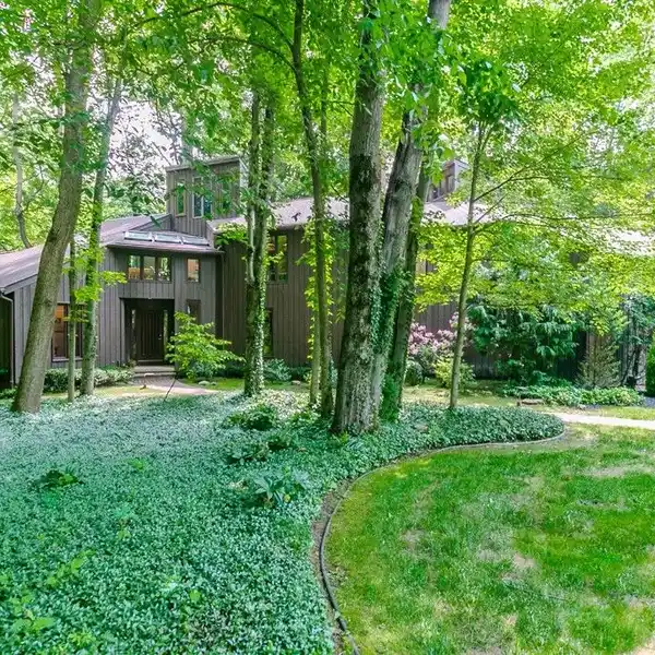 ONE-OF-A-KIND WILLOUGHBY HILLS HOME ON THREE PARK-LIKE ACRES