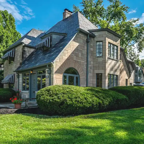 ICONIC HOME WITH STRIKING LIMESTONE EXTERIOR