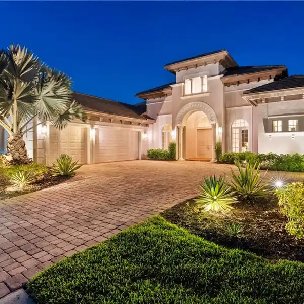MODERN ELEGANCE MEETS RESORT LIVING IN PREMIER GATED ENCLAVE
