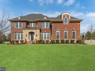 Elegant Brick Estate in Gated Fairwood Community