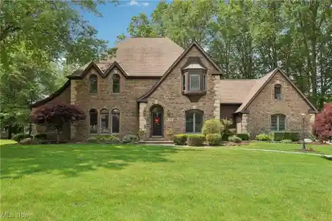 Grand Tudor Style with Heated Three-car Garage