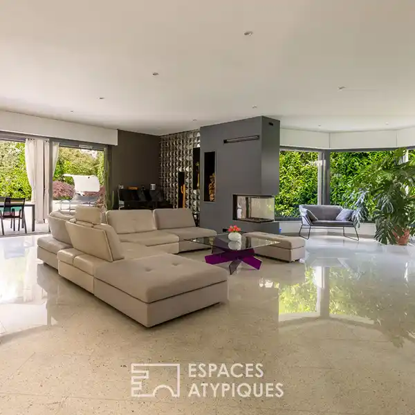 SPACIOUS HOME SURROUNDED BY PRIVATE WOODED GROUNDS