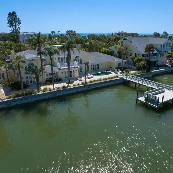 COASTAL SOPHISTICATION STEPS FROM WHITE SAND BEACHES