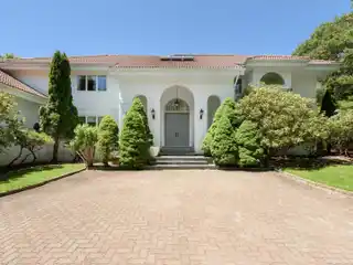 Gorgeous White Stucco Home on over Two Acres