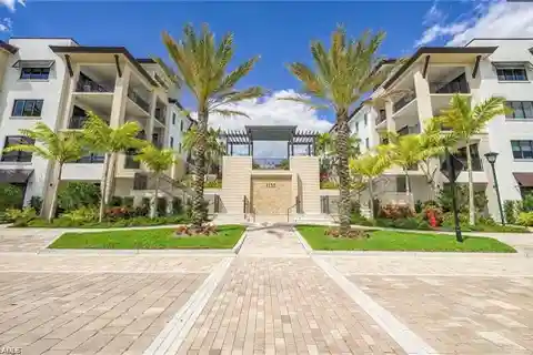 Elevated Living in Prestigious Naples Square