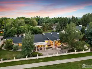 Stunning Boulder Country Club Home with Unobstructed Longs Peak Views and Luxurious Indoor-outdoor Living
