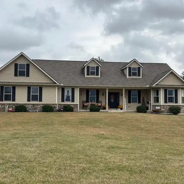 COUNTRY LIVING IN A BEAUTIFUL WELL-BUILT CUSTOM HOME